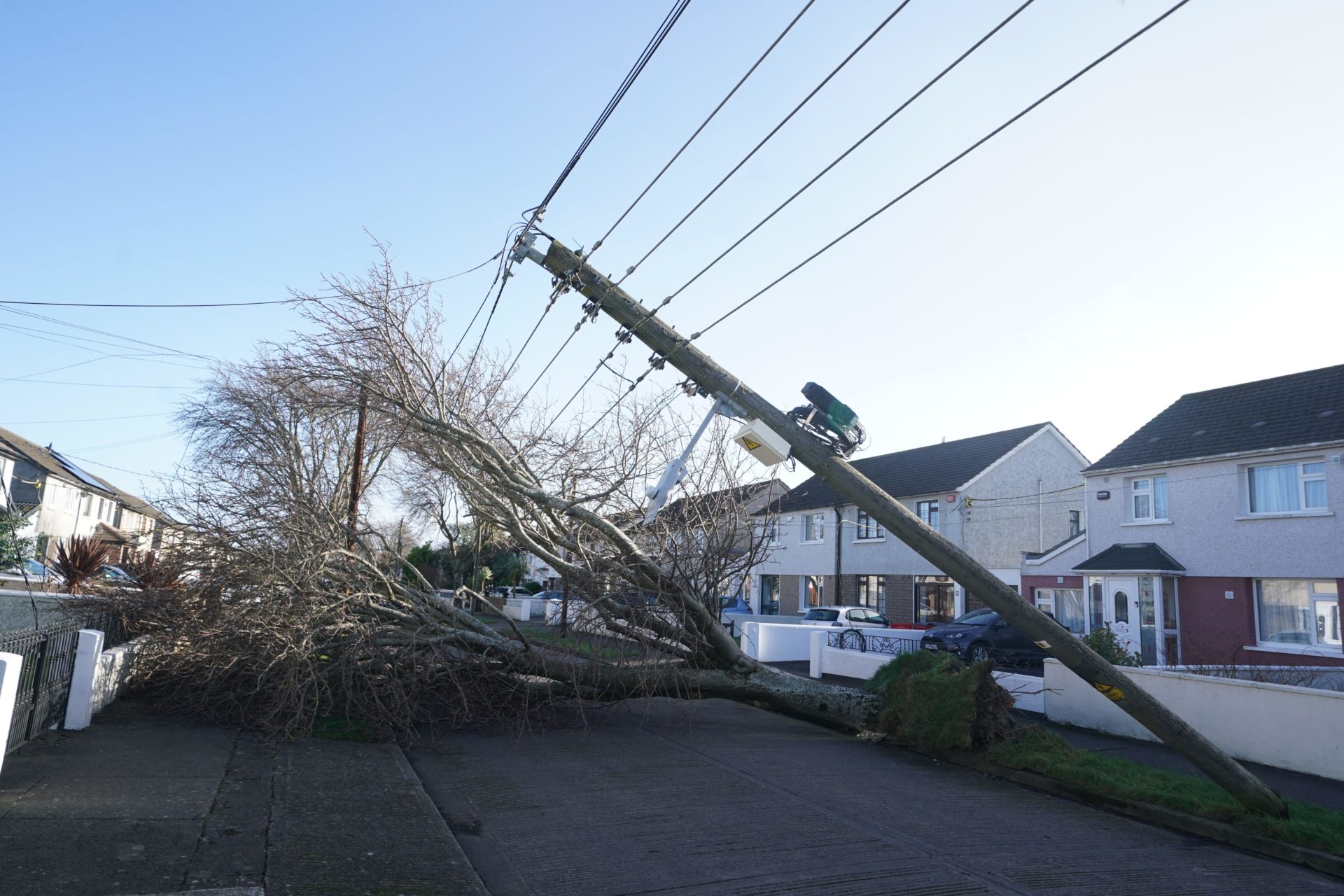 2S92TKW A fallen tree and pole on Grove Park Drive in Dublin. Residents across Ireland have been urged to stay at home as the entire island braces for the arrival of Storm Eowyn. The top-level red warning for wind is in place in both Northern Ireland and the Republic of Ireland. Picture date: Friday January 24, 2025.